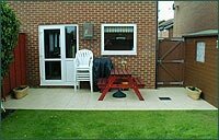 Garden after laying patio tiles